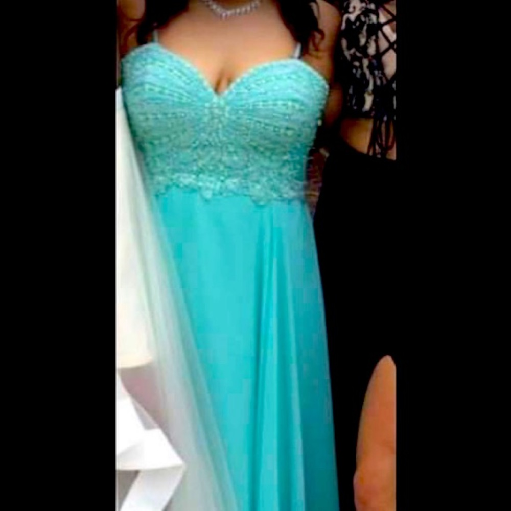 Beautiful Turquoise prom dress.